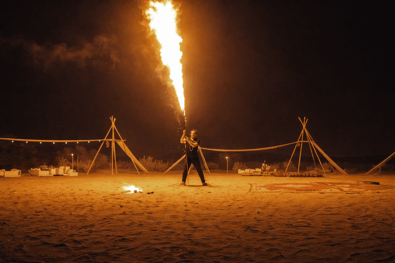 Fire show performance at Zerzura desert camp during dinner experience