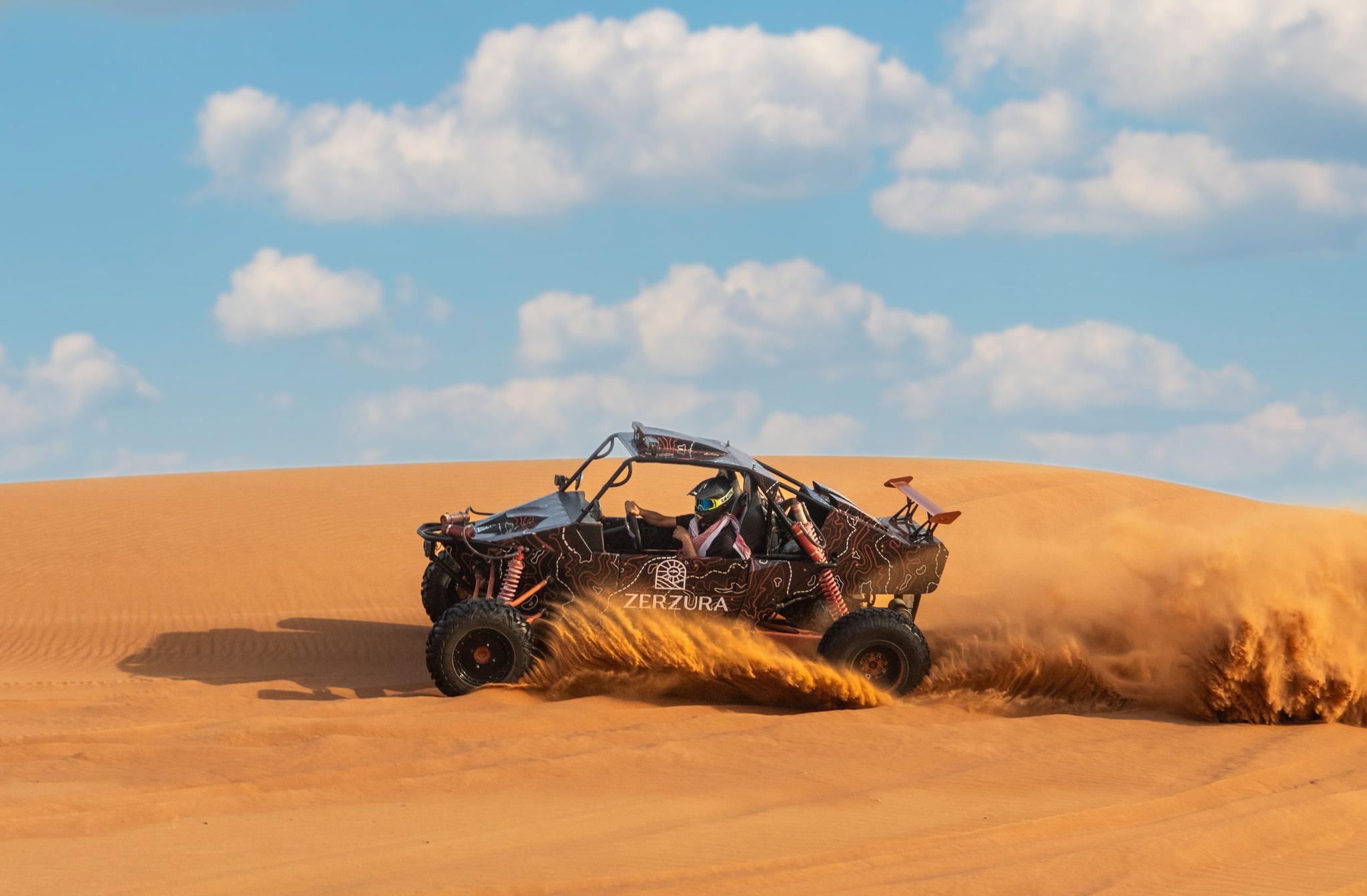 elf-drive buggy in the Mleiha desert near Fossil Rock